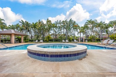 Discover comfort and convenience in this single-level end unit on Hoakalei Country Club At Ocean Pointe in Hawaii - for sale on GolfHomes.com, golf home, golf lot