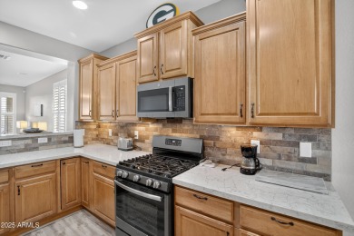 55+ living at its best! Welcome to this updated, low-maintenance on The Golf Club At Johnson Ranch in Arizona - for sale on GolfHomes.com, golf home, golf lot