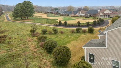 Welcome home to this immaculate 4-bedroom, 2.5-bath townhome on Fox Den Country Club in North Carolina - for sale on GolfHomes.com, golf home, golf lot