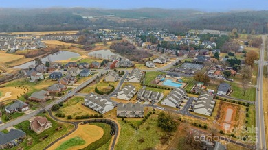 Welcome home to this immaculate 4-bedroom, 2.5-bath townhome on Fox Den Country Club in North Carolina - for sale on GolfHomes.com, golf home, golf lot