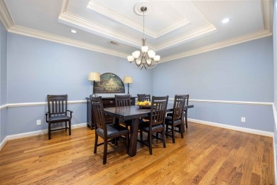 Timeless design, smart functionality, and peaceful lake and golf on Maple Ridge Golf Club in Georgia - for sale on GolfHomes.com, golf home, golf lot