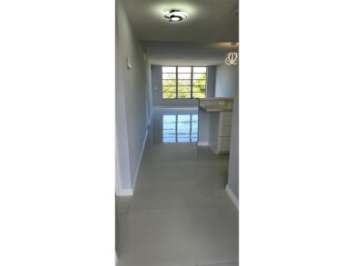 Spacious Remodel VERY BRIGHT Golf and Pool view. NEW A/C on Palm-Aire Country Club and Resort - The Oaks in Florida - for sale on GolfHomes.com, golf home, golf lot