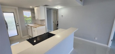 Spacious Remodel VERY BRIGHT Golf and Pool view. NEW A/C on Palm-Aire Country Club and Resort - The Oaks in Florida - for sale on GolfHomes.com, golf home, golf lot