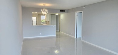 Spacious Remodel VERY BRIGHT Golf and Pool view Partial Impact on Palm-Aire Country Club and Resort - The Oaks in Florida - for sale on GolfHomes.com, golf home, golf lot