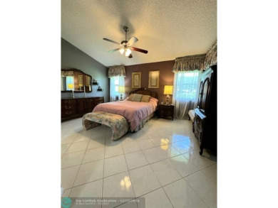 ****  BEAUTIFUL SPACIOUS VILLA OVERLOOKING THE LAKE IN on Gleneagles Golf and Country Club in Florida - for sale on GolfHomes.com, golf home, golf lot