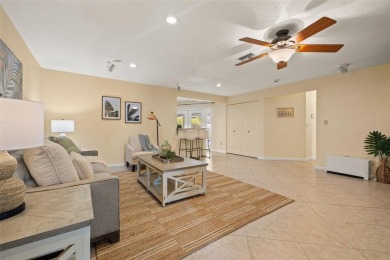 This spacious 4-bedroom, 3-bath POOL home is located in the on Mangrove Bay Golf Course in Florida - for sale on GolfHomes.com, golf home, golf lot