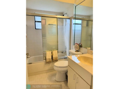 ****  BEAUTIFUL SPACIOUS VILLA OVERLOOKING THE LAKE IN on Gleneagles Golf and Country Club in Florida - for sale on GolfHomes.com, golf home, golf lot
