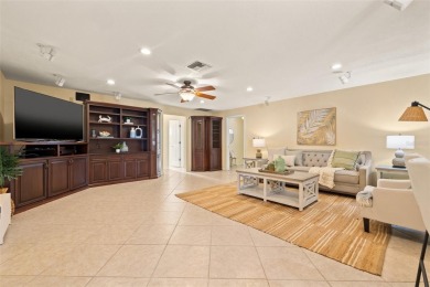 This spacious 4-bedroom, 3-bath POOL home is located in the on Mangrove Bay Golf Course in Florida - for sale on GolfHomes.com, golf home, golf lot