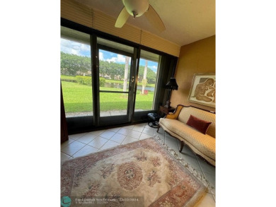 ****  BEAUTIFUL SPACIOUS VILLA OVERLOOKING THE LAKE IN on Gleneagles Golf and Country Club in Florida - for sale on GolfHomes.com, golf home, golf lot