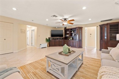 This spacious 4-bedroom, 3-bath POOL home is located in the on Mangrove Bay Golf Course in Florida - for sale on GolfHomes.com, golf home, golf lot
