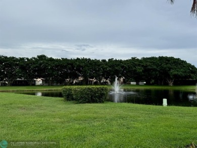 ****  BEAUTIFUL SPACIOUS VILLA OVERLOOKING THE LAKE IN on Gleneagles Golf and Country Club in Florida - for sale on GolfHomes.com, golf home, golf lot