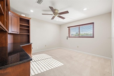 This spacious 4-bedroom, 3-bath POOL home is located in the on Mangrove Bay Golf Course in Florida - for sale on GolfHomes.com, golf home, golf lot
