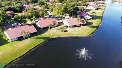 ****  BEAUTIFUL SPACIOUS VILLA OVERLOOKING THE LAKE IN on Gleneagles Golf and Country Club in Florida - for sale on GolfHomes.com, golf home, golf lot