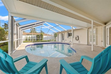 This spacious 4-bedroom, 3-bath POOL home is located in the on Mangrove Bay Golf Course in Florida - for sale on GolfHomes.com, golf home, golf lot