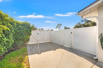 This spacious 4-bedroom, 3-bath POOL home is located in the on Mangrove Bay Golf Course in Florida - for sale on GolfHomes.com, golf home, golf lot