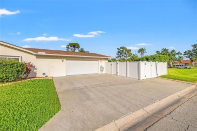 This spacious 4-bedroom, 3-bath POOL home is located in the on Mangrove Bay Golf Course in Florida - for sale on GolfHomes.com, golf home, golf lot