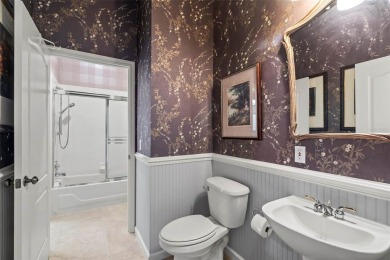 SWEEPING WATER VIEWS and oak-lined streets, all with convenient on The Venice Golf and Country Club in Florida - for sale on GolfHomes.com, golf home, golf lot