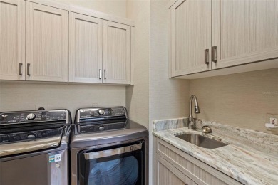 SWEEPING WATER VIEWS and oak-lined streets, all with convenient on The Venice Golf and Country Club in Florida - for sale on GolfHomes.com, golf home, golf lot