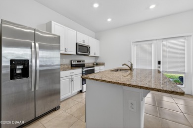 Live the Venetian Bay lifestyle in this stylish 2022-built on Venetian Bay Golf Course in Florida - for sale on GolfHomes.com, golf home, golf lot