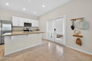 Live the Venetian Bay lifestyle in this stylish 2022-built on Venetian Bay Golf Course in Florida - for sale on GolfHomes.com, golf home, golf lot