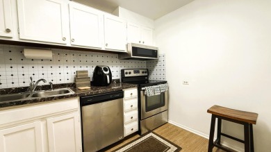 Discover this beautifully updated 1-bedroom, 1.5-bath apartment on Inverrary Country Club in Florida - for sale on GolfHomes.com, golf home, golf lot