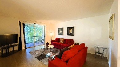 Discover this beautifully updated 1-bedroom, 1.5-bath apartment on Inverrary Country Club in Florida - for sale on GolfHomes.com, golf home, golf lot