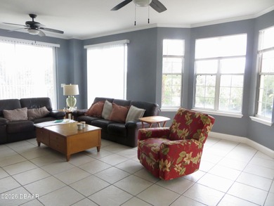 Bright open plan corner unit has TWO balconies overlooking woods on Harbour Village Golf and Yacht Club in Florida - for sale on GolfHomes.com, golf home, golf lot