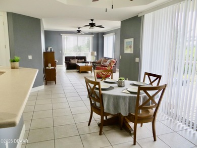 Bright open plan corner unit has TWO balconies overlooking woods on Harbour Village Golf and Yacht Club in Florida - for sale on GolfHomes.com, golf home, golf lot