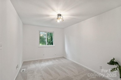 PRIMARY bedroom on the MAIN and on a GOLF COURSE! Unique on Raintree Country Club in North Carolina - for sale on GolfHomes.com, golf home, golf lot