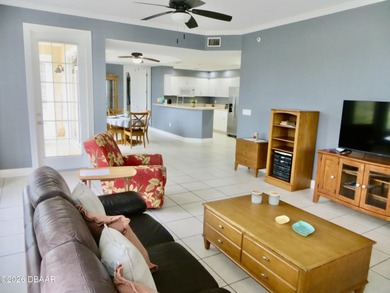 Bright open plan corner unit has TWO balconies overlooking woods on Harbour Village Golf and Yacht Club in Florida - for sale on GolfHomes.com, golf home, golf lot