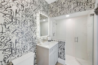 Worthy of an Architectural Digest feature, this stunning on Wildcat Run Golf and Country Club in Florida - for sale on GolfHomes.com, golf home, golf lot