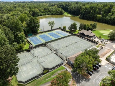 PRIMARY bedroom on the MAIN and on a GOLF COURSE! Unique on Raintree Country Club in North Carolina - for sale on GolfHomes.com, golf home, golf lot