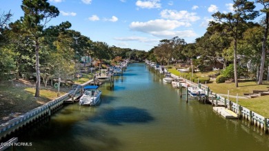 You just can't beat canal front living in Pine Knoll Shores! And on The Country Club of the Crystal Coast in North Carolina - for sale on GolfHomes.com, golf home, golf lot