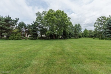 Welcome to this stunning 4-bedroom, 3.5-bath Colonial nestled in on Fox Meadow Country Club in Ohio - for sale on GolfHomes.com, golf home, golf lot