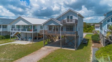 Perched on pilings and perfectly positioned to capture sweeping on Founders Club At St. James Plantation in North Carolina - for sale on GolfHomes.com, golf home, golf lot