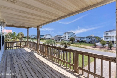 Perched on pilings and perfectly positioned to capture sweeping on Founders Club At St. James Plantation in North Carolina - for sale on GolfHomes.com, golf home, golf lot