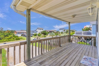 Perched on pilings and perfectly positioned to capture sweeping on Founders Club At St. James Plantation in North Carolina - for sale on GolfHomes.com, golf home, golf lot