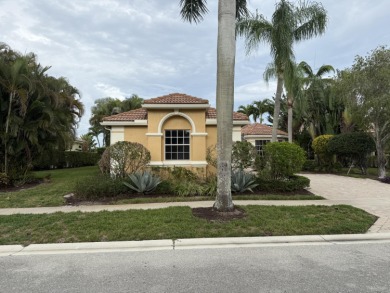 This 3-bedroom plus den, 3.5-bath home is located in the on Wycliffe Golf and Country Club in Florida - for sale on GolfHomes.com, golf home, golf lot