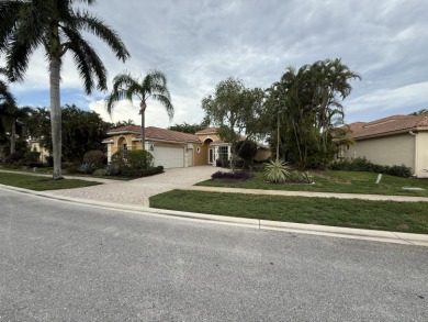 This 3-bedroom plus den, 3.5-bath home is located in the on Wycliffe Golf and Country Club in Florida - for sale on GolfHomes.com, golf home, golf lot