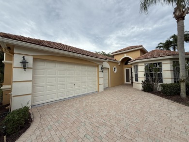 This 3-bedroom plus den, 3.5-bath home is located in the on Wycliffe Golf and Country Club in Florida - for sale on GolfHomes.com, golf home, golf lot