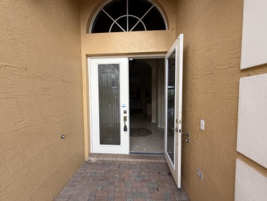 This 3-bedroom plus den, 3.5-bath home is located in the on Wycliffe Golf and Country Club in Florida - for sale on GolfHomes.com, golf home, golf lot