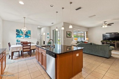 Discover the perfect blend of comfort and elegance in this on Venetian Bay Golf Course in Florida - for sale on GolfHomes.com, golf home, golf lot