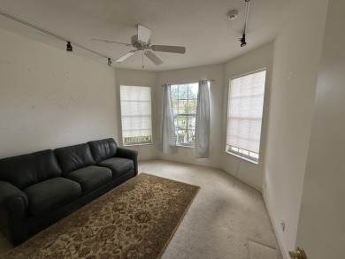 This 3-bedroom plus den, 3.5-bath home is located in the on Wycliffe Golf and Country Club in Florida - for sale on GolfHomes.com, golf home, golf lot