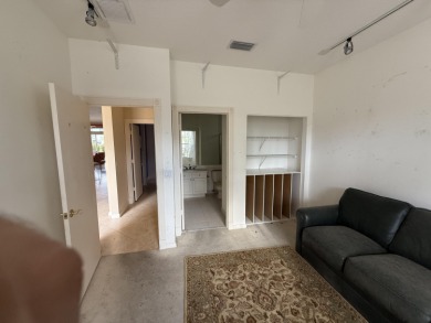 This 3-bedroom plus den, 3.5-bath home is located in the on Wycliffe Golf and Country Club in Florida - for sale on GolfHomes.com, golf home, golf lot