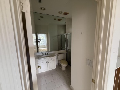 This 3-bedroom plus den, 3.5-bath home is located in the on Wycliffe Golf and Country Club in Florida - for sale on GolfHomes.com, golf home, golf lot