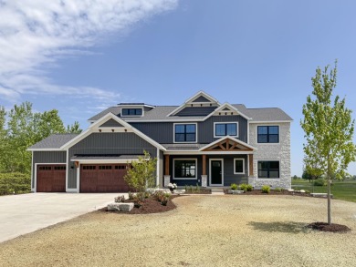 This home by Bosgraaf Homes is unlike any other, located in the on The Macatwa Legends Golf Course in Michigan - for sale on GolfHomes.com, golf home, golf lot