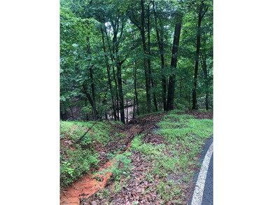 Build your dream home on this 0.78-acre buildable lot in the on Big Canoe Golf Club - Cherokee in Georgia - for sale on GolfHomes.com, golf home, golf lot