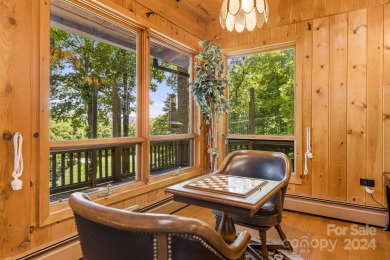 This rustic ranch, located w/in the exclusive Wolf Laurel on Wolf Laurel Country Club in North Carolina - for sale on GolfHomes.com, golf home, golf lot