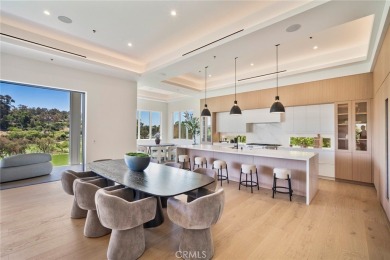 Rising above the prestigious El Niguel Country Club, this on El Niguel Country Club in California - for sale on GolfHomes.com, golf home, golf lot