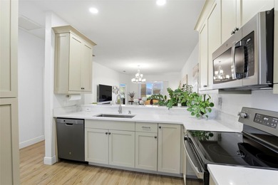 Enjoy maintenance-free living in this beautifully updated on Remington Golf Club in Florida - for sale on GolfHomes.com, golf home, golf lot